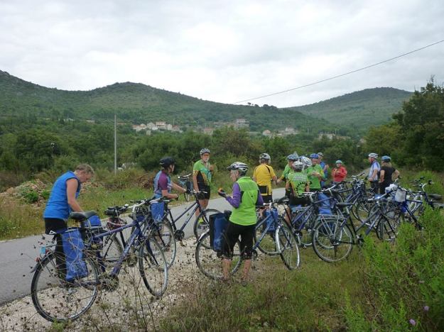 Thunder rolls ominously overhead as we decide to avoid the final hilltop climb